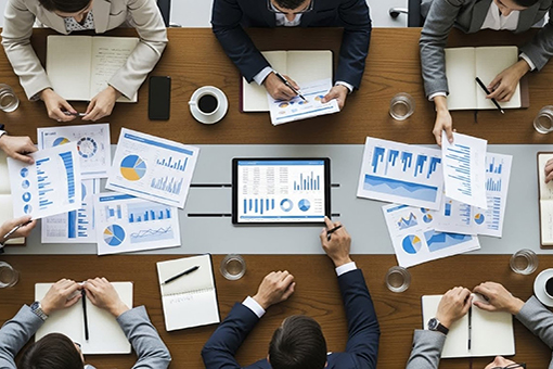 Team Members of Land O Lakes Company Discussing Business Growth in a Meeting Room